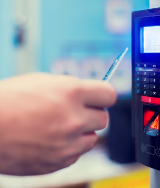 Door access control. Selective focus to card reader machine with